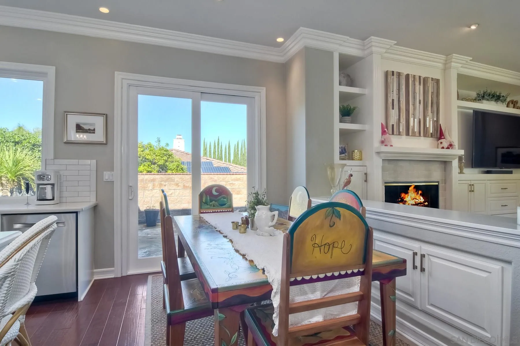 11739 Treadwell Drive Poway, CA 92064 - Photo 10 of 46 a living room with furniture a fireplace and a flat screen tv