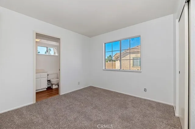 an empty room with shelves