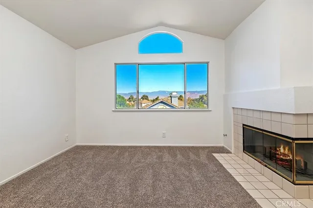 a view of a livingroom with a fireplace