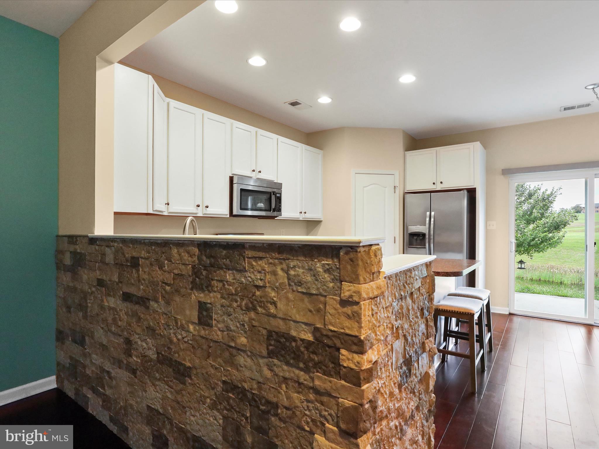 53 Ran Rue Drive Martinsburg, WV 25403 - Photo 37 of 38 Open floor plan with a high bar