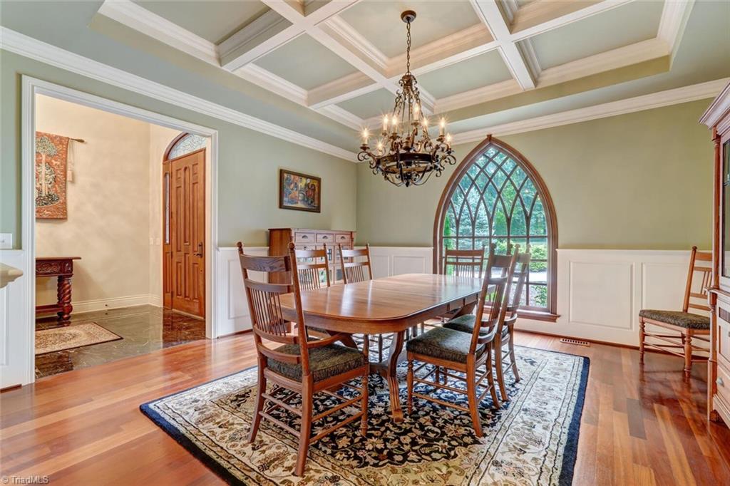 7809 Gold Ridge Road Oak Ridge, NC 27310 - Photo 6 of 50 DINING FEATURES COFFERED CEILING AND CUSTOM DESIGNED WINDOW