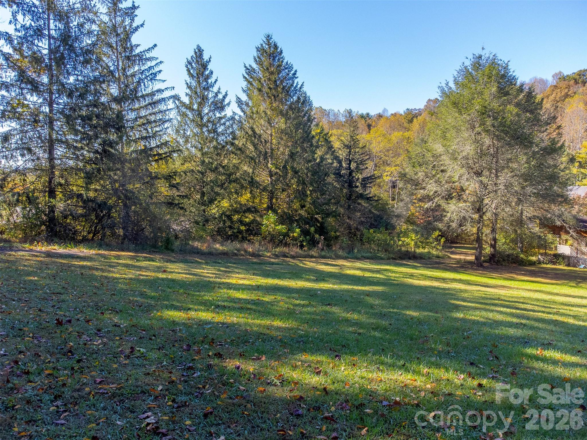 120 Trimont Trail Franklin, NC 28734 - Photo 11 of 33 a view of a golf course with a lake