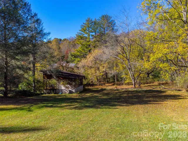 a view of a swimming pool with an outdoor space
