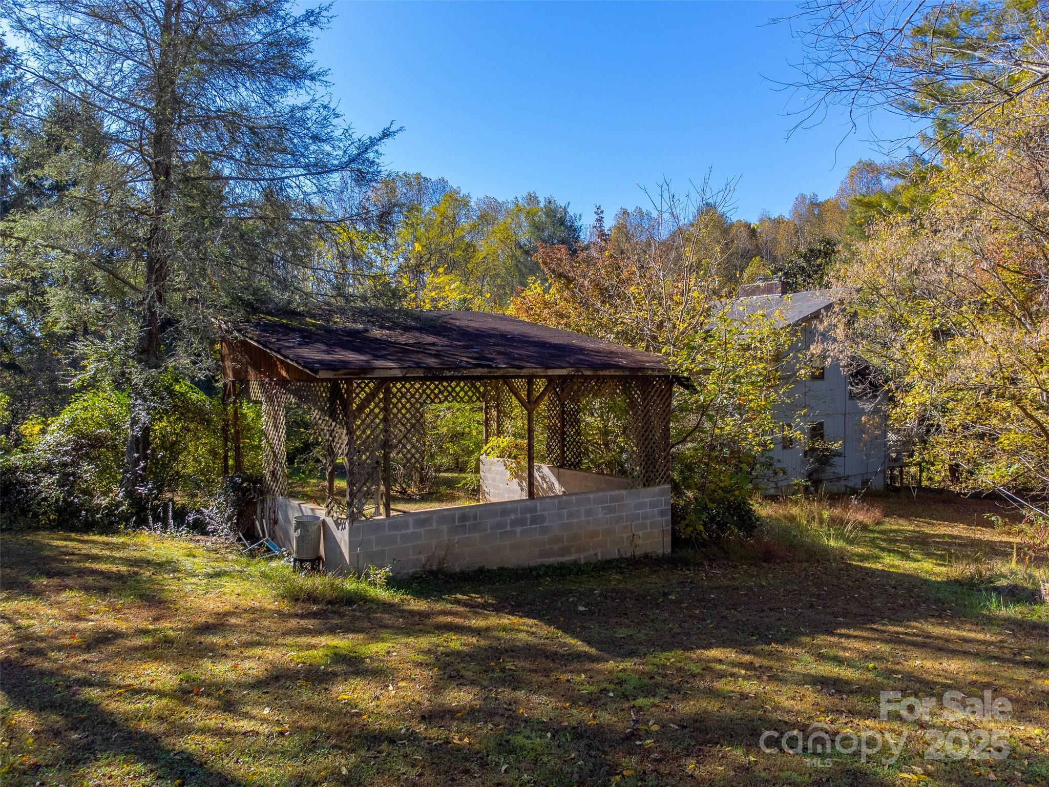 120 Trimont Trail Franklin, NC 28734 - Photo 12 of 33 a view of a backyard with sitting area