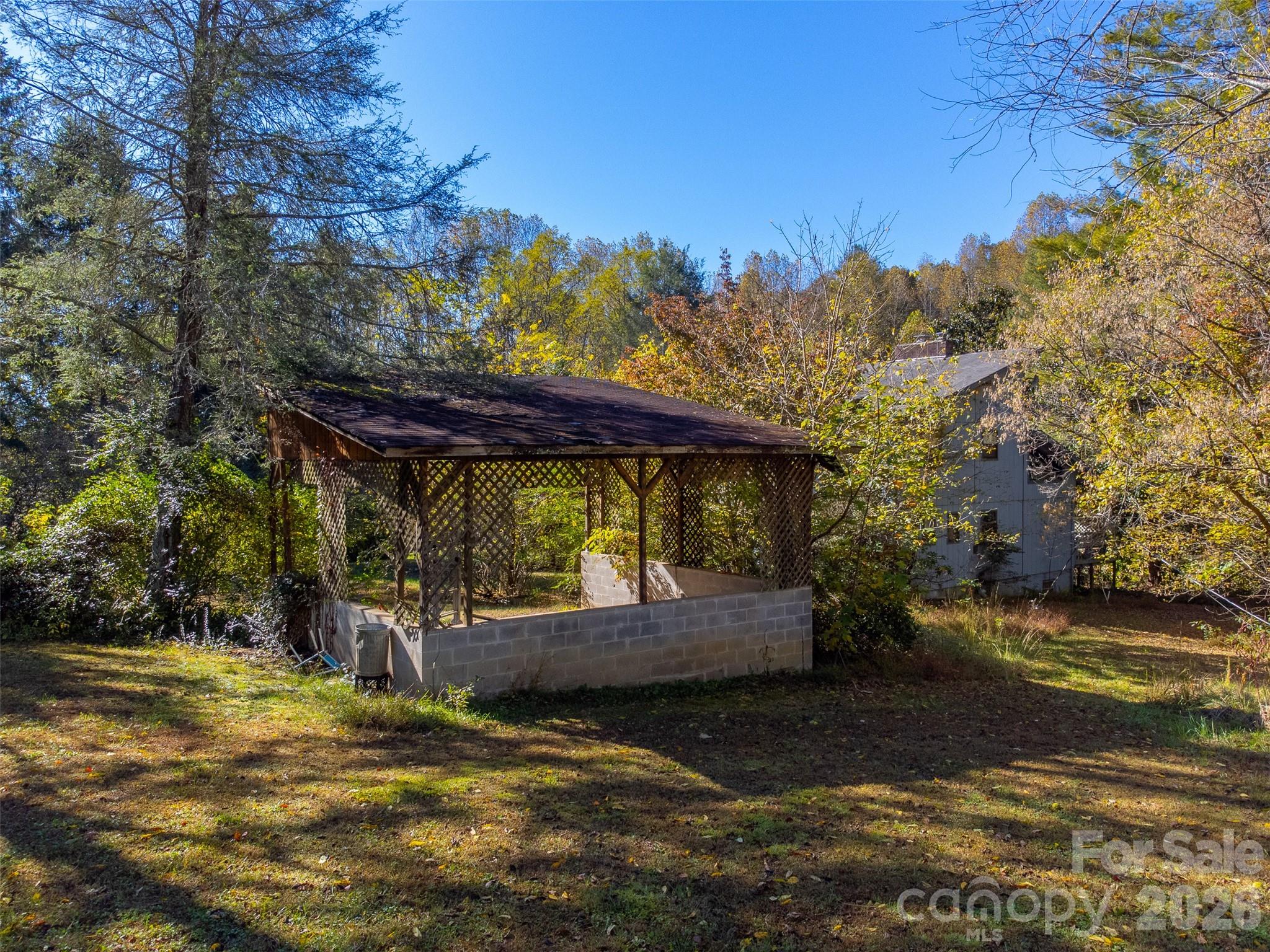 120 Trimont Trail Franklin, NC 28734 - Photo 13 of 33 a view of a backyard with sitting area