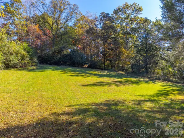 a view of a swimming pool and an outdoor space