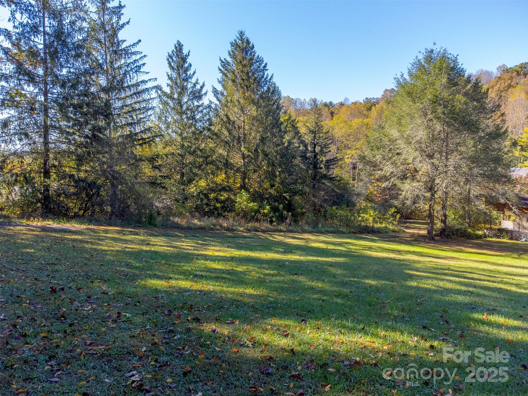 120 Trimont Trail Franklin, NC 28734 - Photo 9 of 33 a view of a golf course with a lake