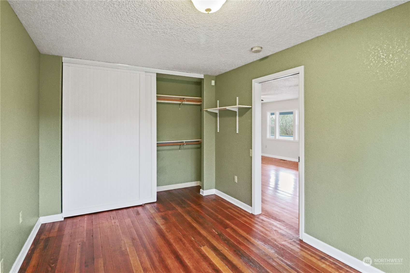 203 Stearns Road Chehalis, WA 98532 - Photo 13 of 34 a view of empty room with wooden floor