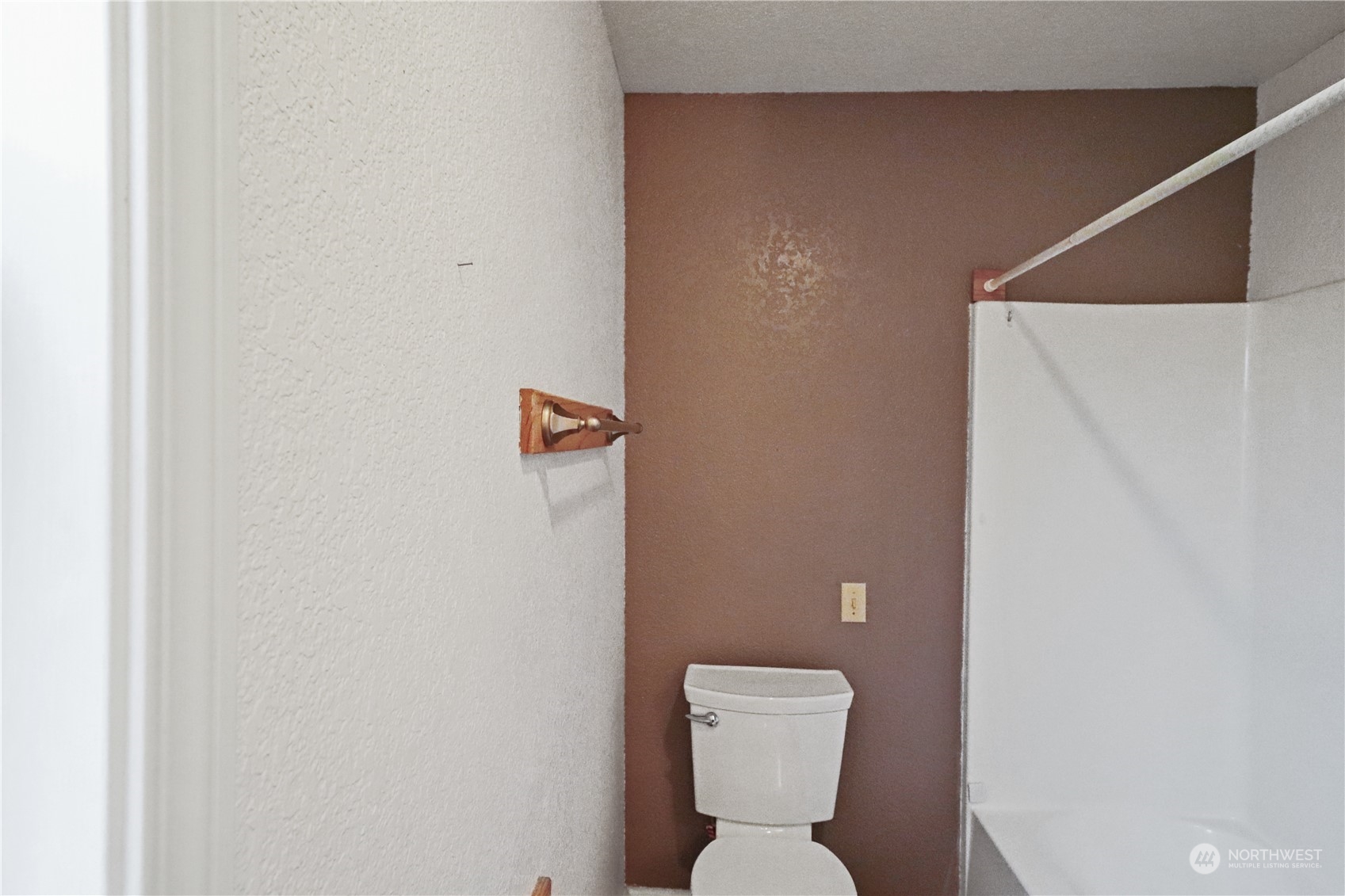 203 Stearns Road Chehalis, WA 98532 - Photo 15 of 34 a white toilet sitting next to a white wall