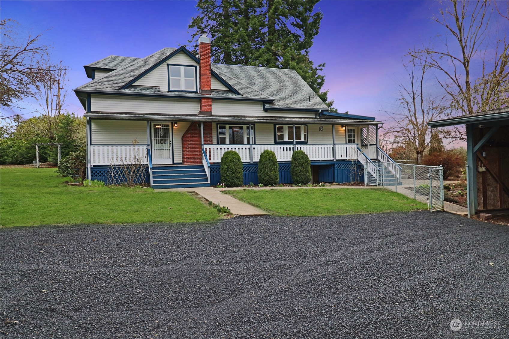 203 Stearns Road Chehalis, WA 98532 - Photo 2 of 34 a front view of a house with a yard and garage