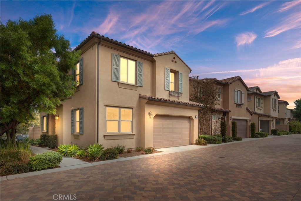 48 Clover Lake Forest, CA 92630 - Photo 1 of 1 a front view of a house with a yard