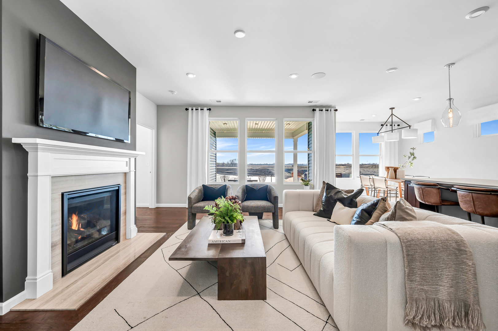 3256 Oak Creek Lane Aurora, IL 60503 - Photo 5 of 19 a living room with furniture fireplace and a flat screen tv