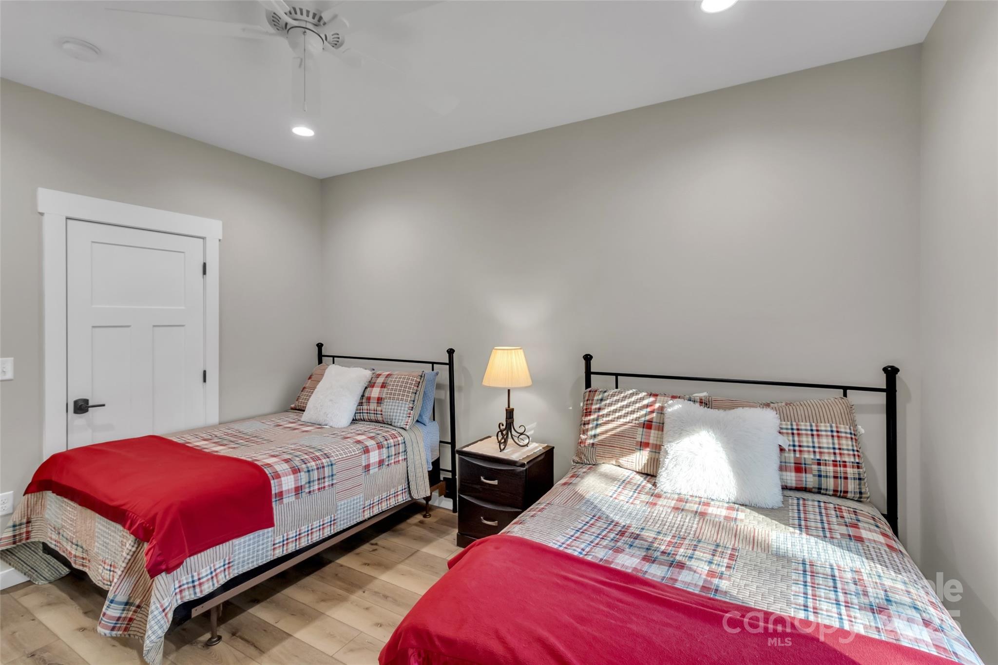 78 Rio Bravo Drive Sylva, NC 28779 - Photo 17 of 19 a bedroom with a bed and a lamp