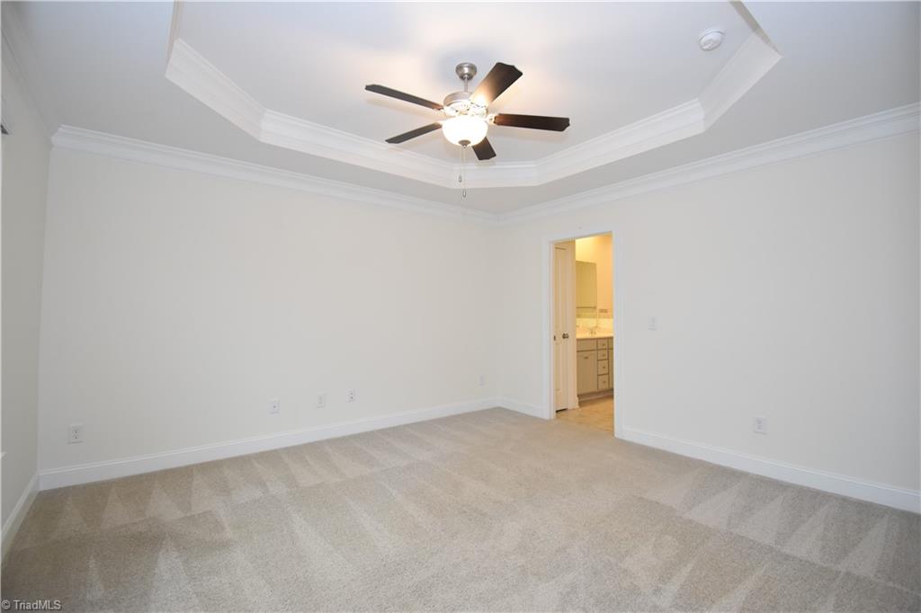 2270 Willard Dairy Road High Point, NC 27265 - Photo 14 of 28 The first floor primary bedroom. plenty of room for a king sized bed.