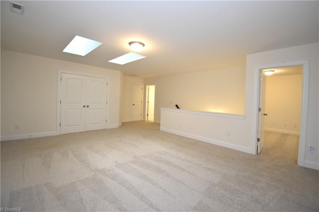 2270 Willard Dairy Road High Point, NC 27265 - Photo 23 of 28 A view back to the upstairs full bathroom. Lets walk through the door on the right to the upstairs guest bedroom.