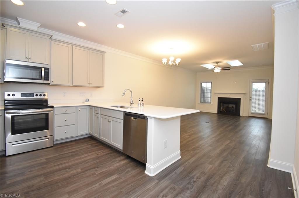 2270 Willard Dairy Road High Point, NC 27265 - Photo 6 of 28 This is open concept living at its finest. we have 2 skylights above the gas log fireplace, which flows into the dinning area and then into the kitchen. Out the back door (photos coming soon) is the fenced in paved patio.