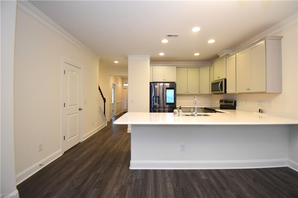 2270 Willard Dairy Road High Point, NC 27265 - Photo 9 of 28 The pantry is on the left what a great place to prepare a meal.
