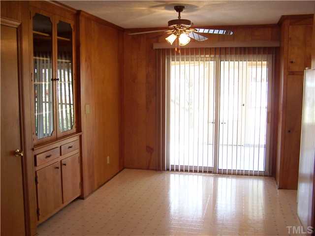 8520 Fayetteville Road Raleigh, NC 27603 - Photo 4 of 25 Dining area with built-in-cubbard.