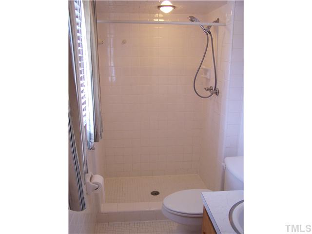 8520 Fayetteville Road Raleigh, NC 27603 - Photo 6 of 25 Master bath with tiled shower & floor.