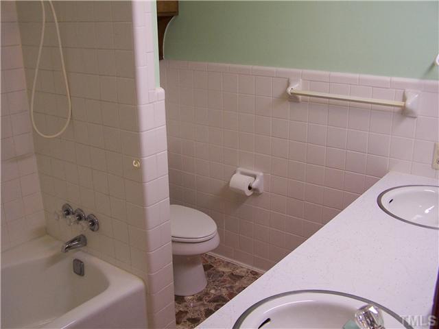 8520 Fayetteville Road Raleigh, NC 27603 - Photo 7 of 25 Hall bath with dual vanity.