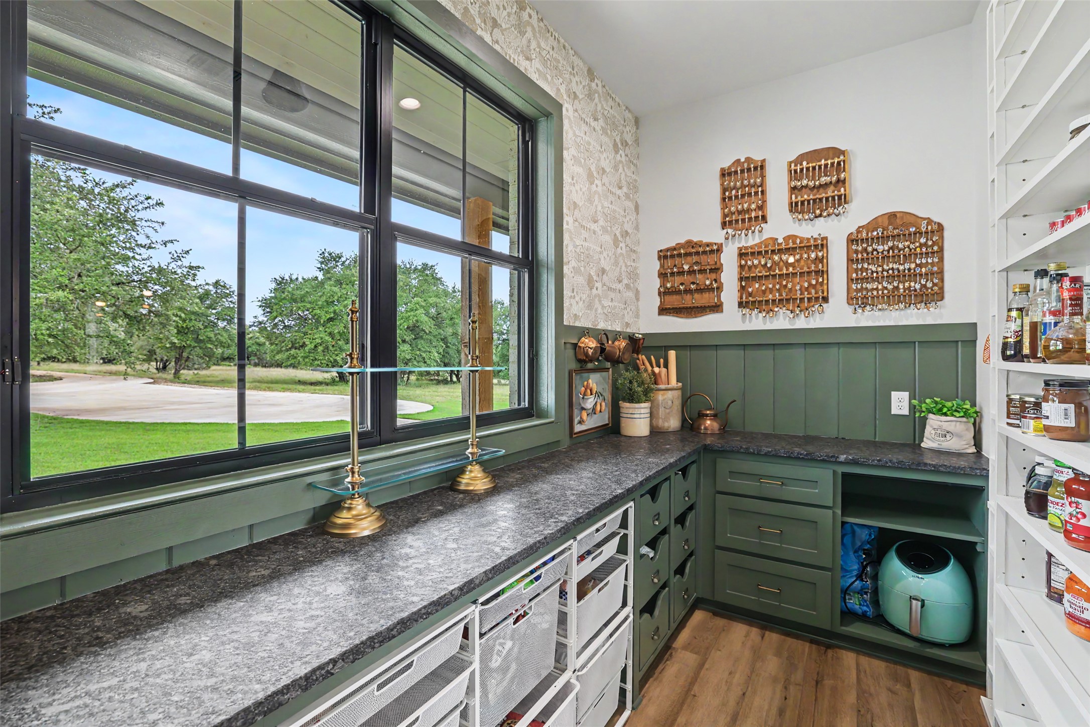 7670 Shiny Top Ranch Lane Salado, TX 76571 - Photo 14 of 40 a kitchen with a sink and a large window