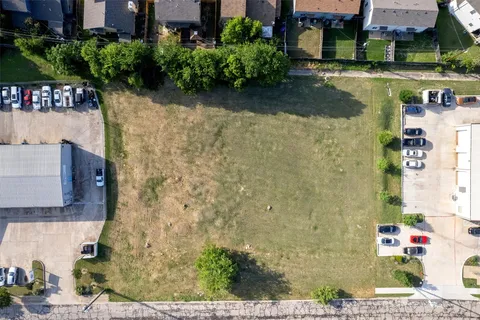 a aerial view of a house with outdoor space