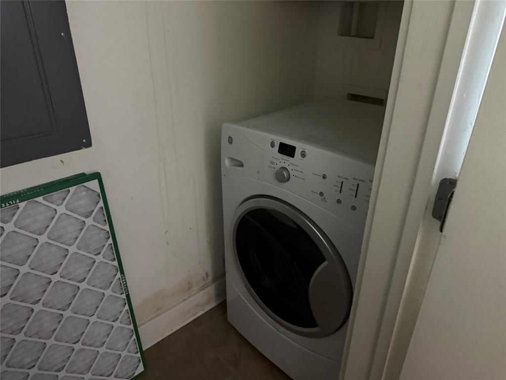 2502 Live Oak Street, Unit 228 Dallas, TX 75204 - Photo 15 of 21 a utility room with dryer and washer