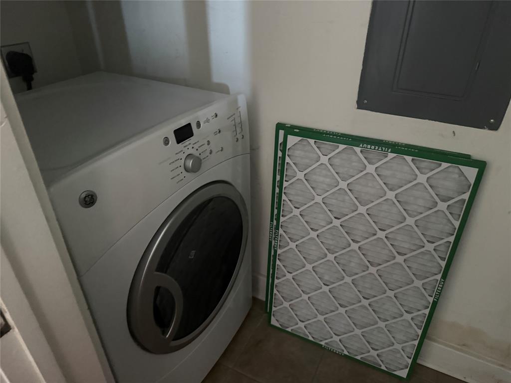 2502 Live Oak Street, Unit 228 Dallas, TX 75204 - Photo 16 of 21 a close up view of a washer and dryer