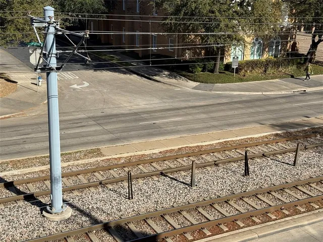 a view of a yard with wooden floor
