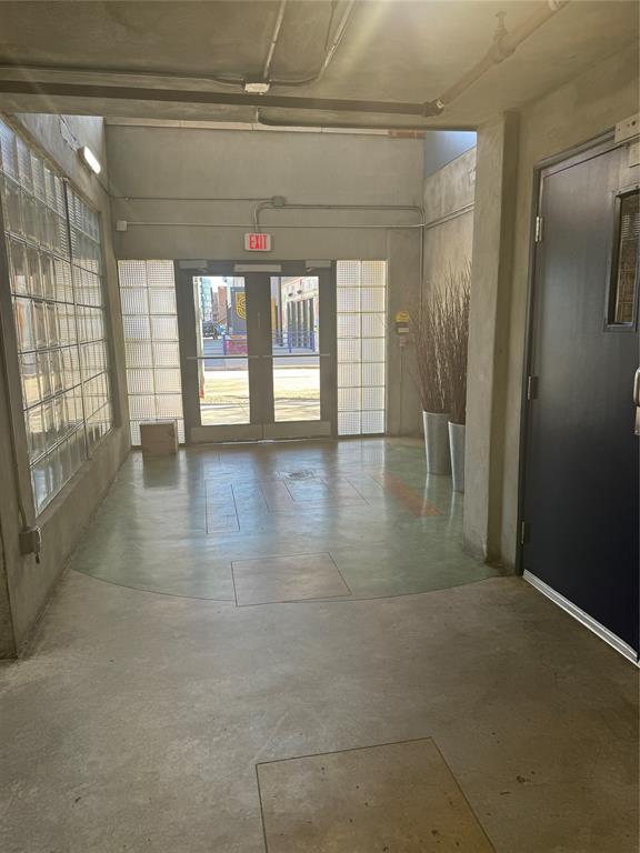 2502 Live Oak Street, Unit 228 Dallas, TX 75204 - Photo 3 of 21 a view of an empty room with a window