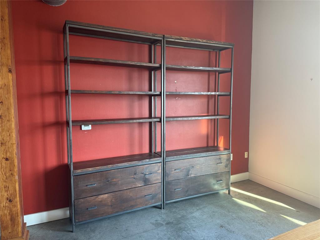 2502 Live Oak Street, Unit 228 Dallas, TX 75204 - Photo 7 of 21 a room with walk in closet and empty racks