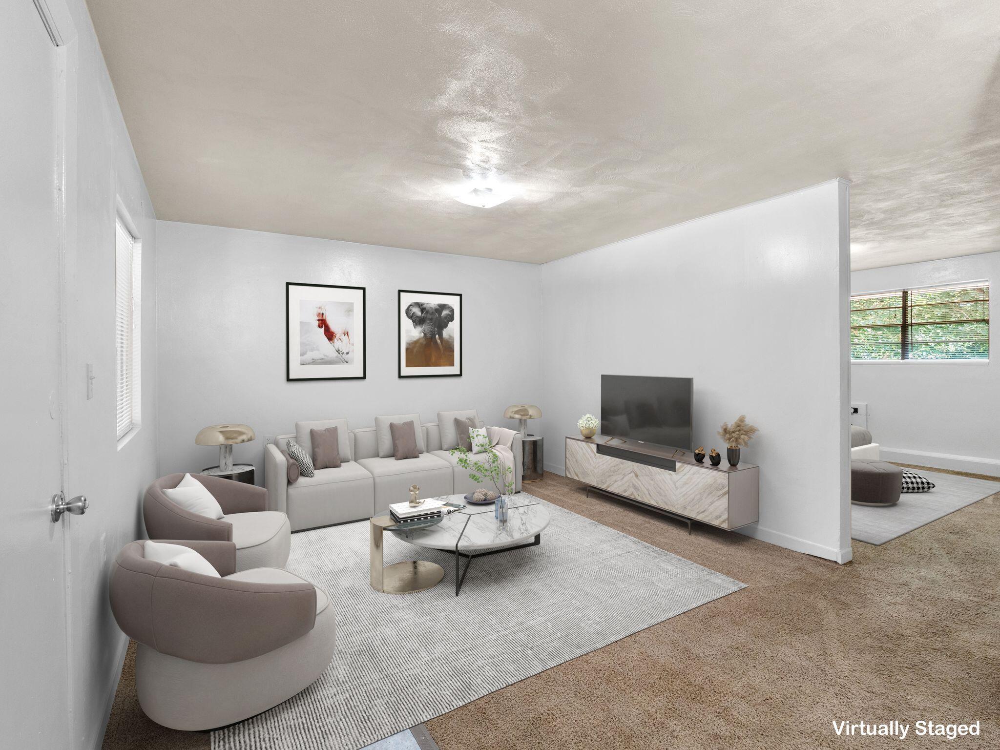 300 Ridgeview Lane, Unit 59 Bassett, VA 24055 - Photo 21 of 23 a living room with furniture and a flat screen tv