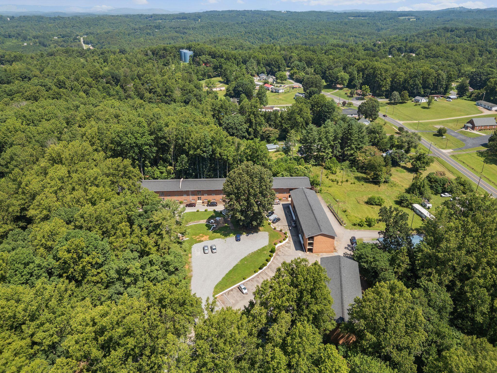 300 Ridgeview Lane, Unit 59 Bassett, VA 24055 - Photo 3 of 23 an aerial view of a house with a yard
