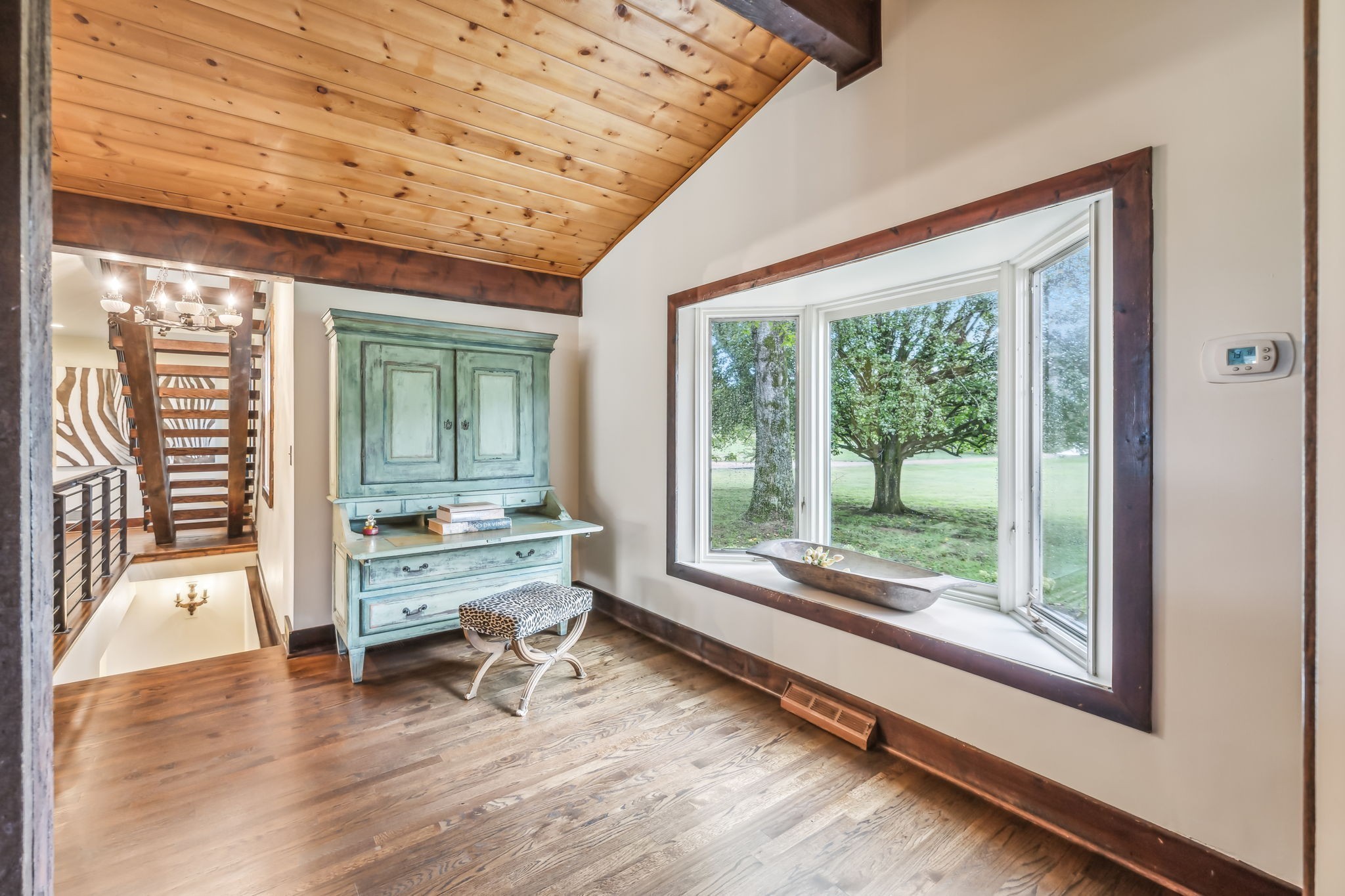 2864 Sawyer Bend Road Nashville, TN 37221 - Photo 14 of 94 a view of a large room with wooden floor and windows