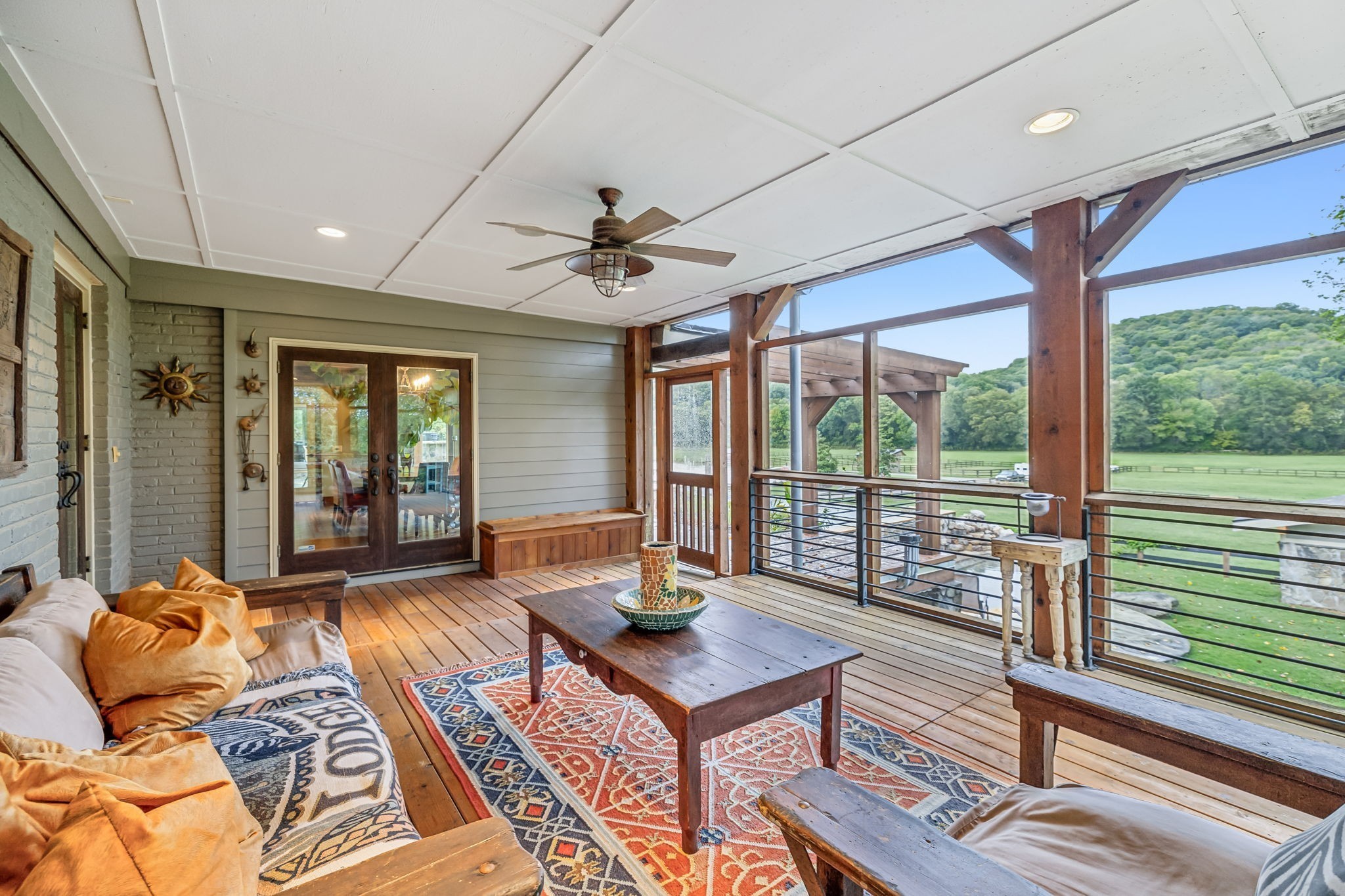 2864 Sawyer Bend Road Nashville, TN 37221 - Photo 21 of 94 a living room with furniture and floor to ceiling windows