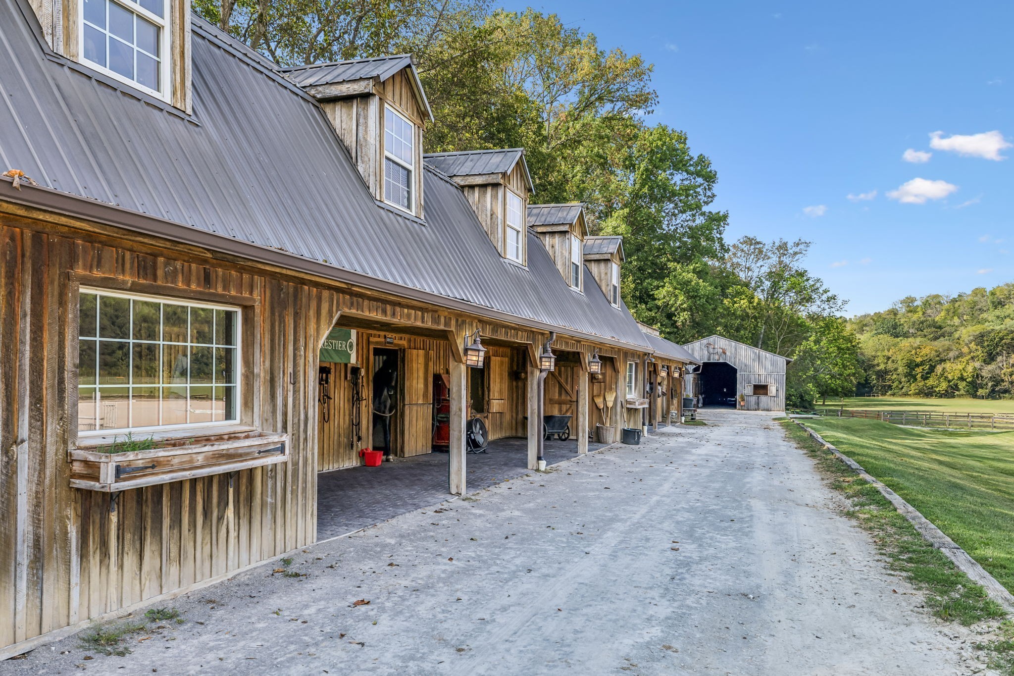 2864 Sawyer Bend Road Nashville, TN 37221 - Photo 3 of 94 a view of a house with a yard and wooden fence