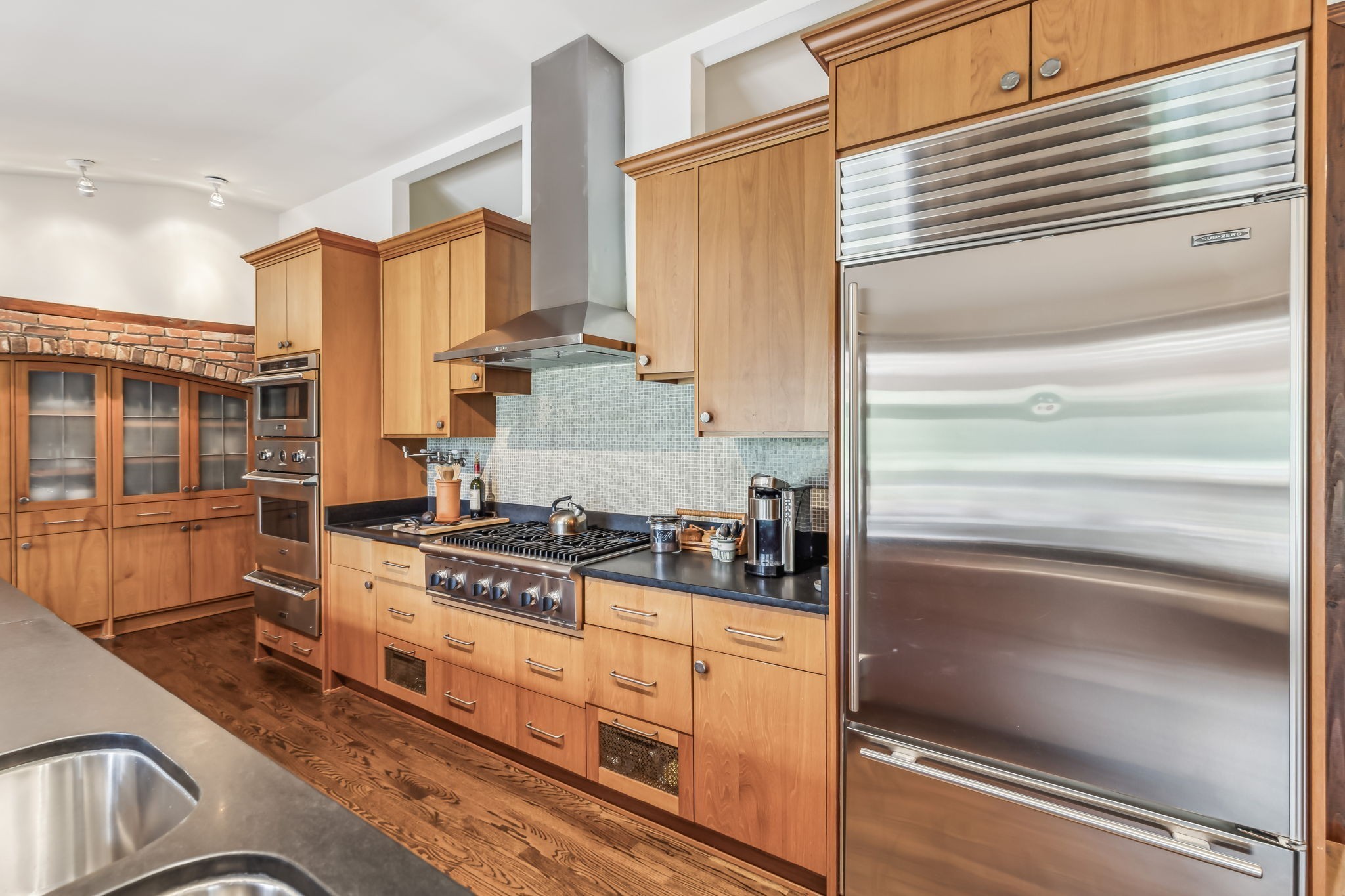 2864 Sawyer Bend Road Nashville, TN 37221 - Photo 34 of 94 a kitchen with stainless steel appliances granite countertop a stove and a refrigerator