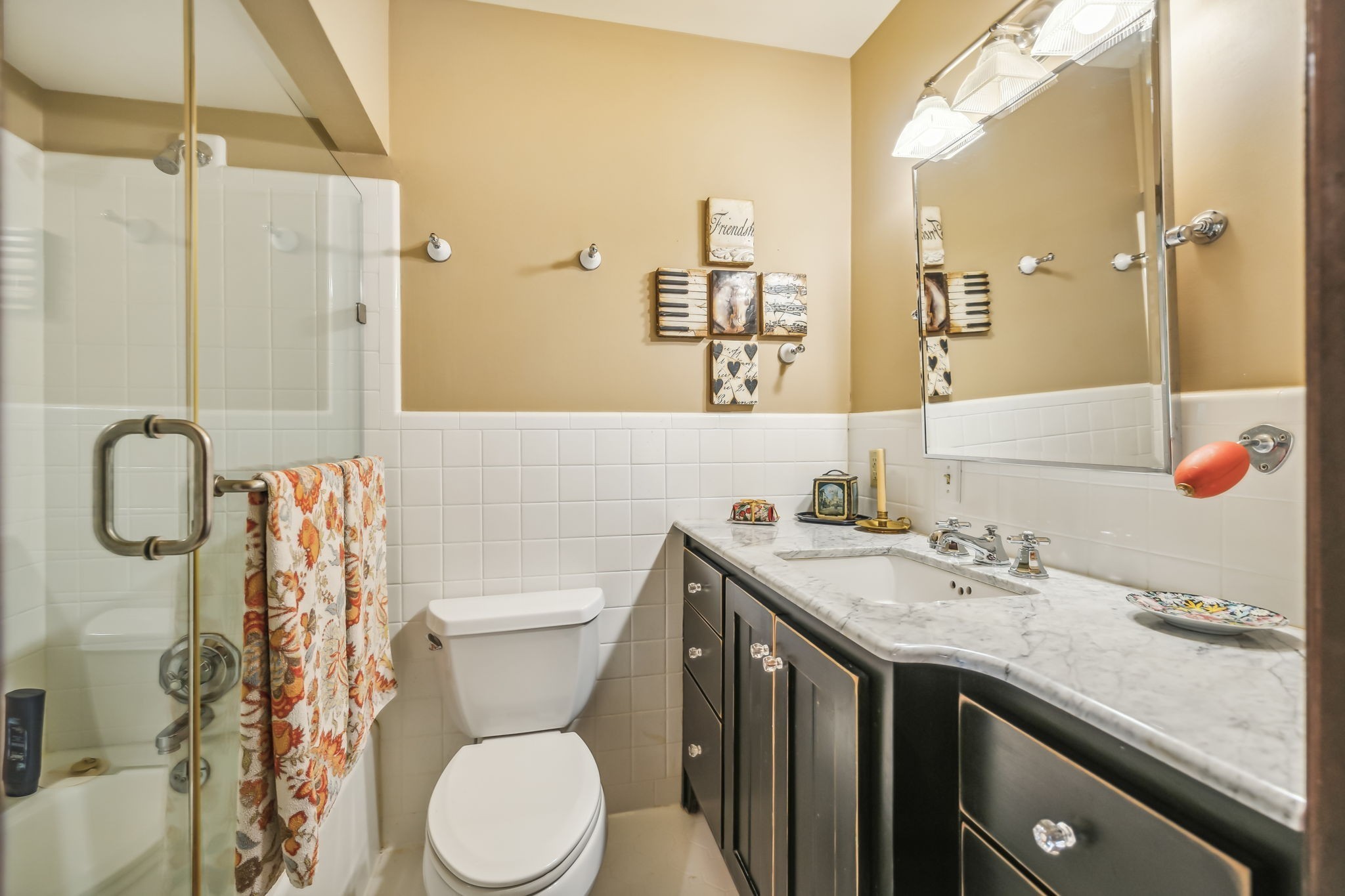 2864 Sawyer Bend Road Nashville, TN 37221 - Photo 42 of 94 a bathroom with a granite countertop toilet sink and a mirror