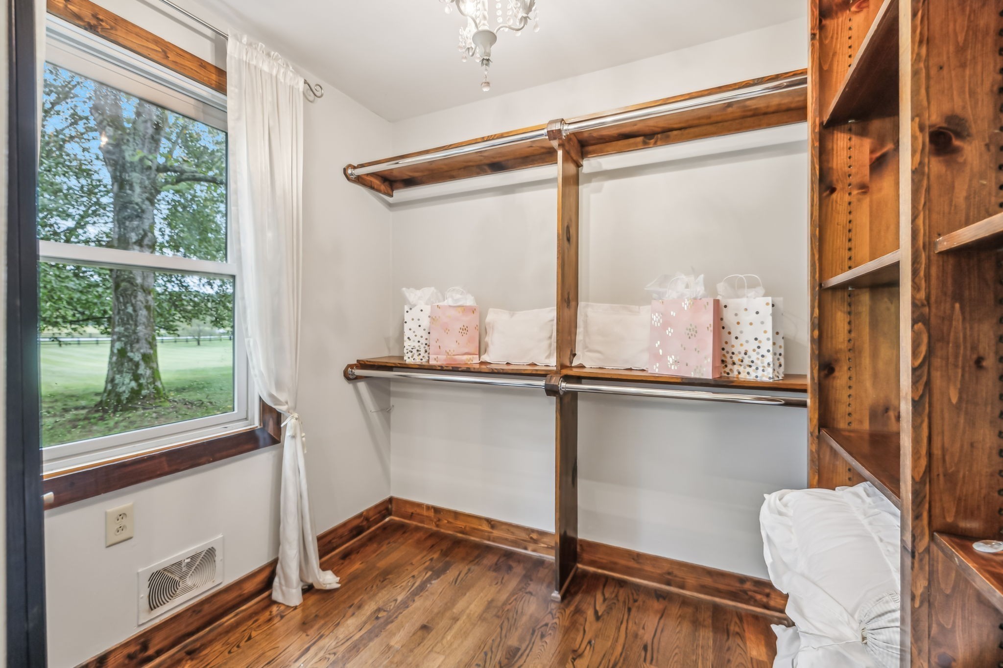 2864 Sawyer Bend Road Nashville, TN 37221 - Photo 48 of 94 a view of an empty room with wooden floor and a window