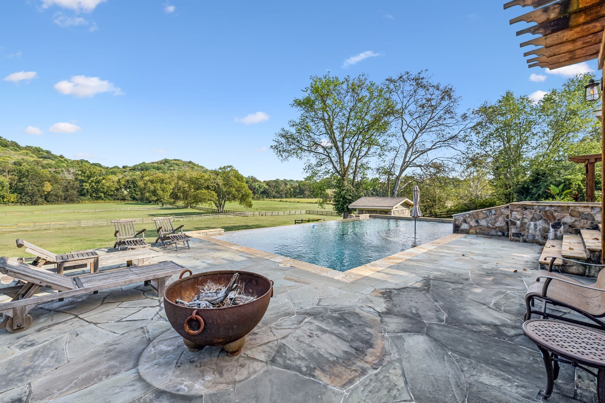 2864 Sawyer Bend Road Nashville, TN 37221 - Photo 68 of 94 a view of swimming pool with lounge chair and lake view