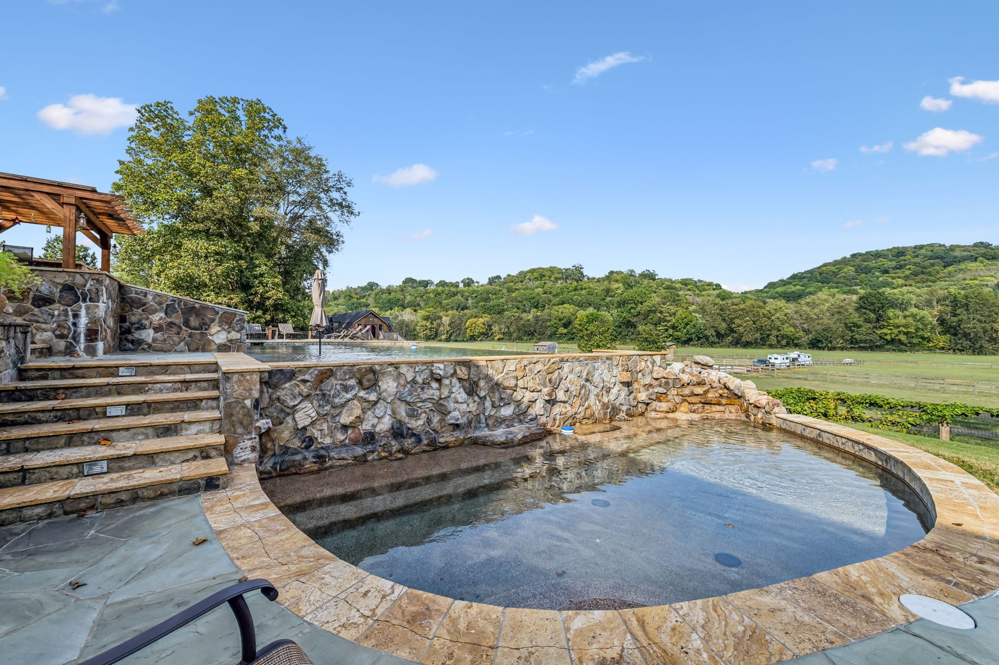 2864 Sawyer Bend Road Nashville, TN 37221 - Photo 72 of 94 a view of a swimming pool with a yard