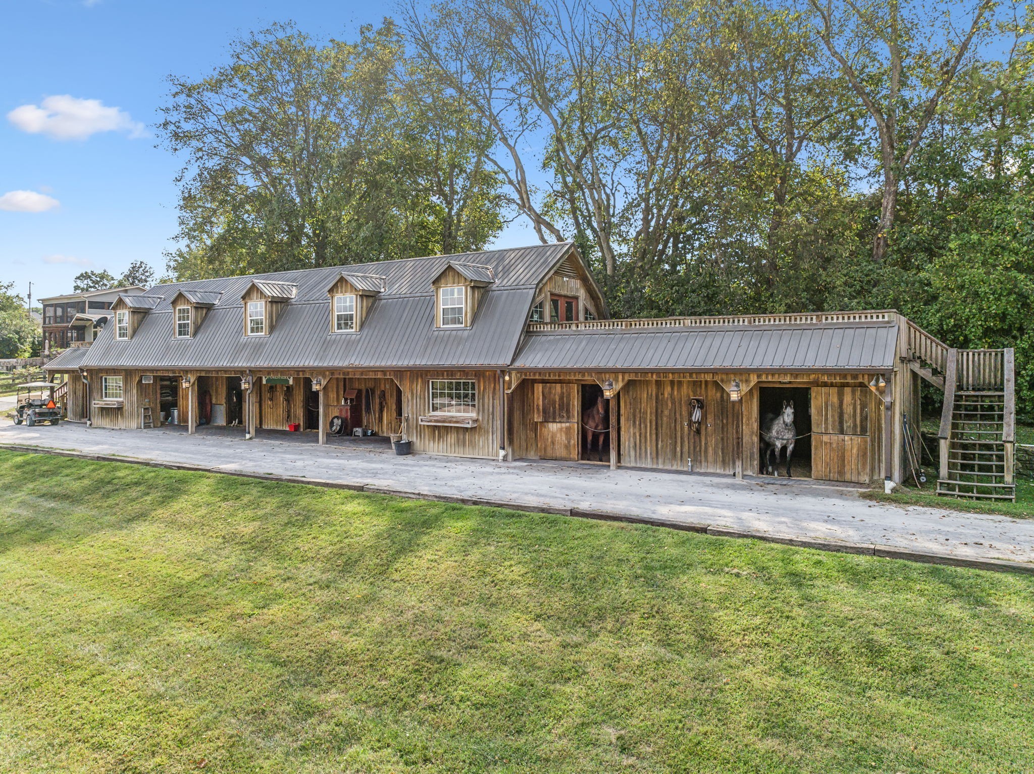 2864 Sawyer Bend Road Nashville, TN 37221 - Photo 77 of 94 a view of a house with a big yard and large tree
