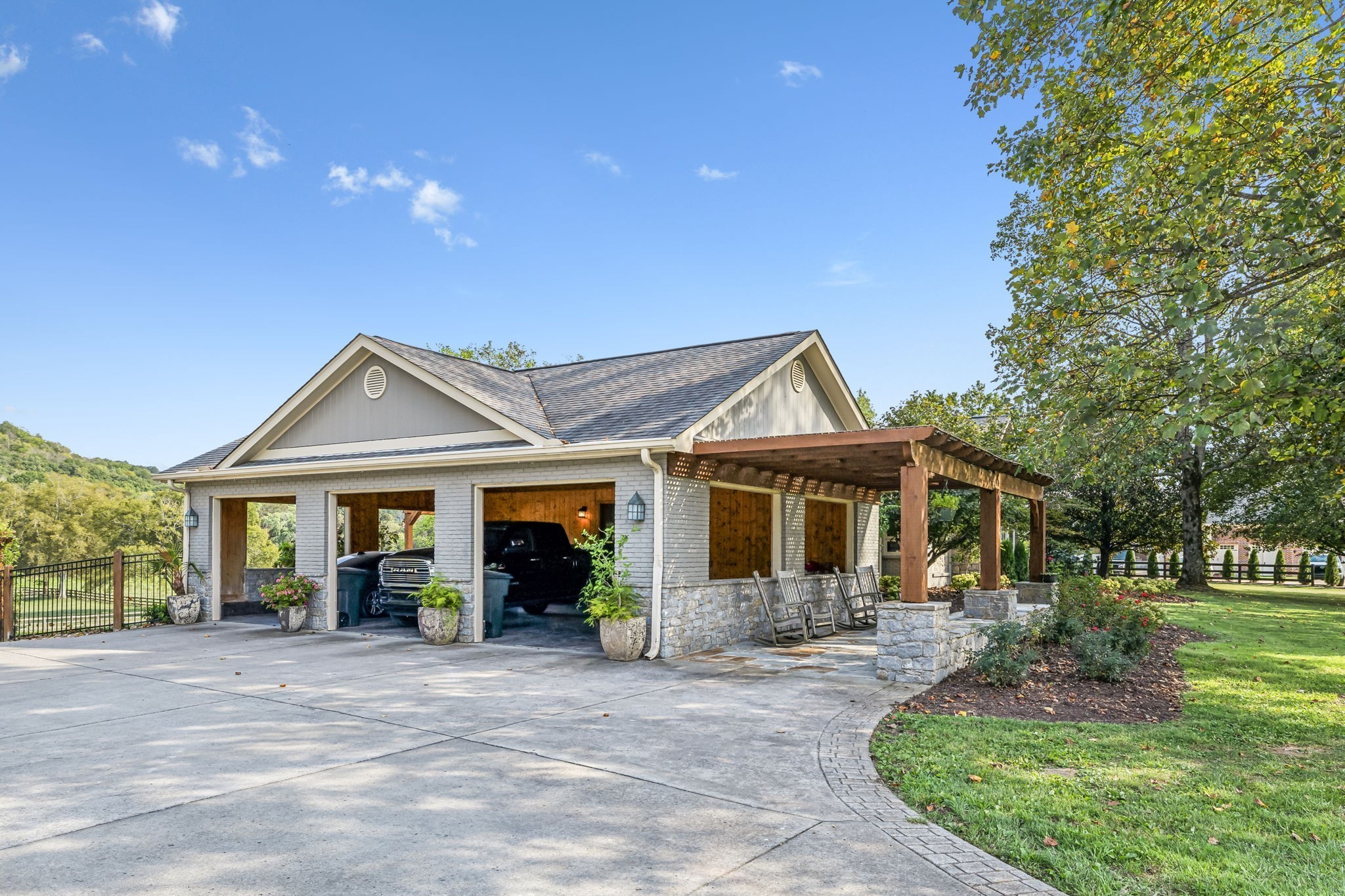 2864 Sawyer Bend Road Nashville, TN 37221 - Photo 9 of 94 a front view of a house with yard patio and green space