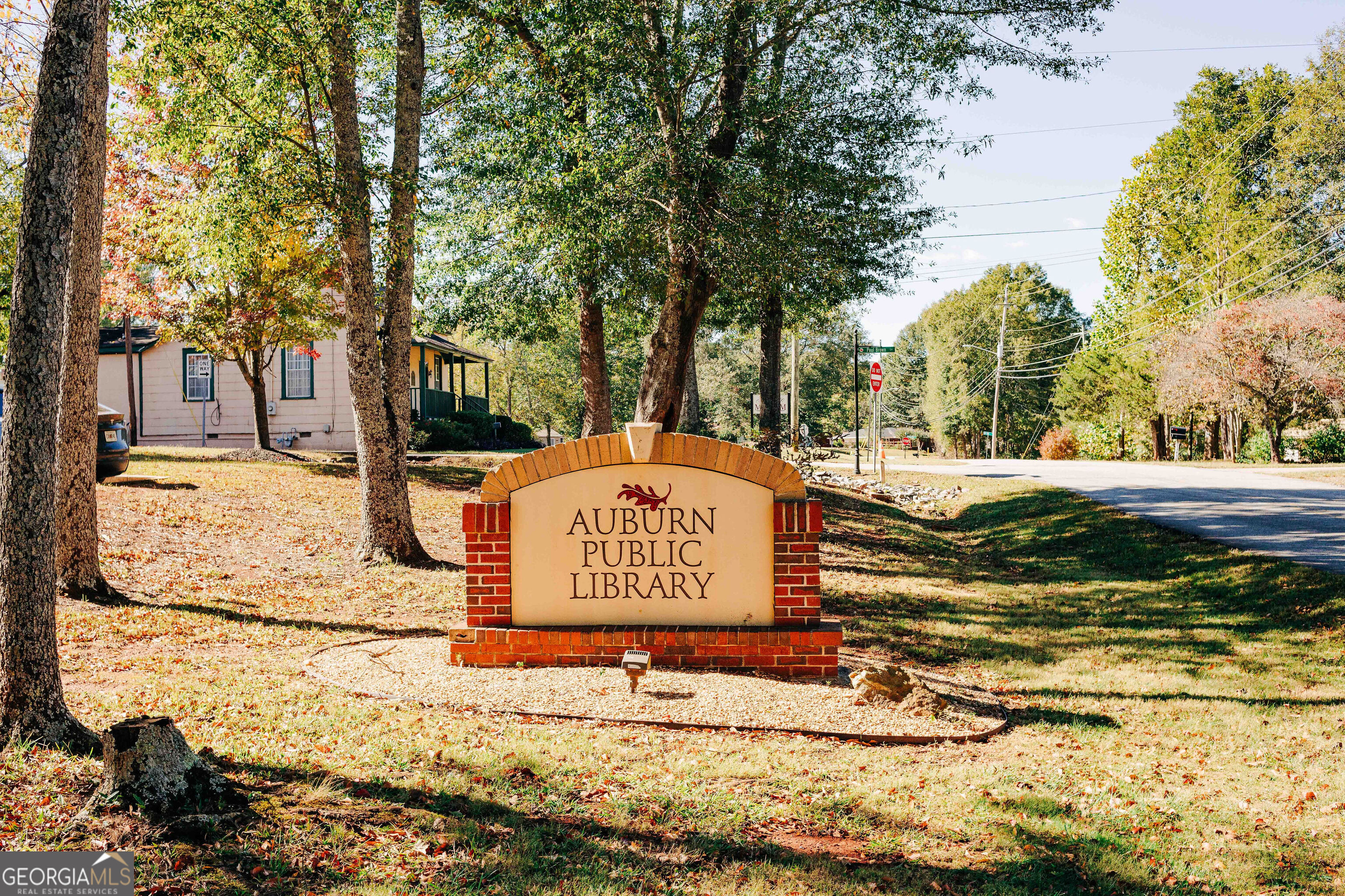 71 Avian Way, Unit 17B Auburn, GA 30011 - Photo 23 of 32 a view of outdoor space with sign board