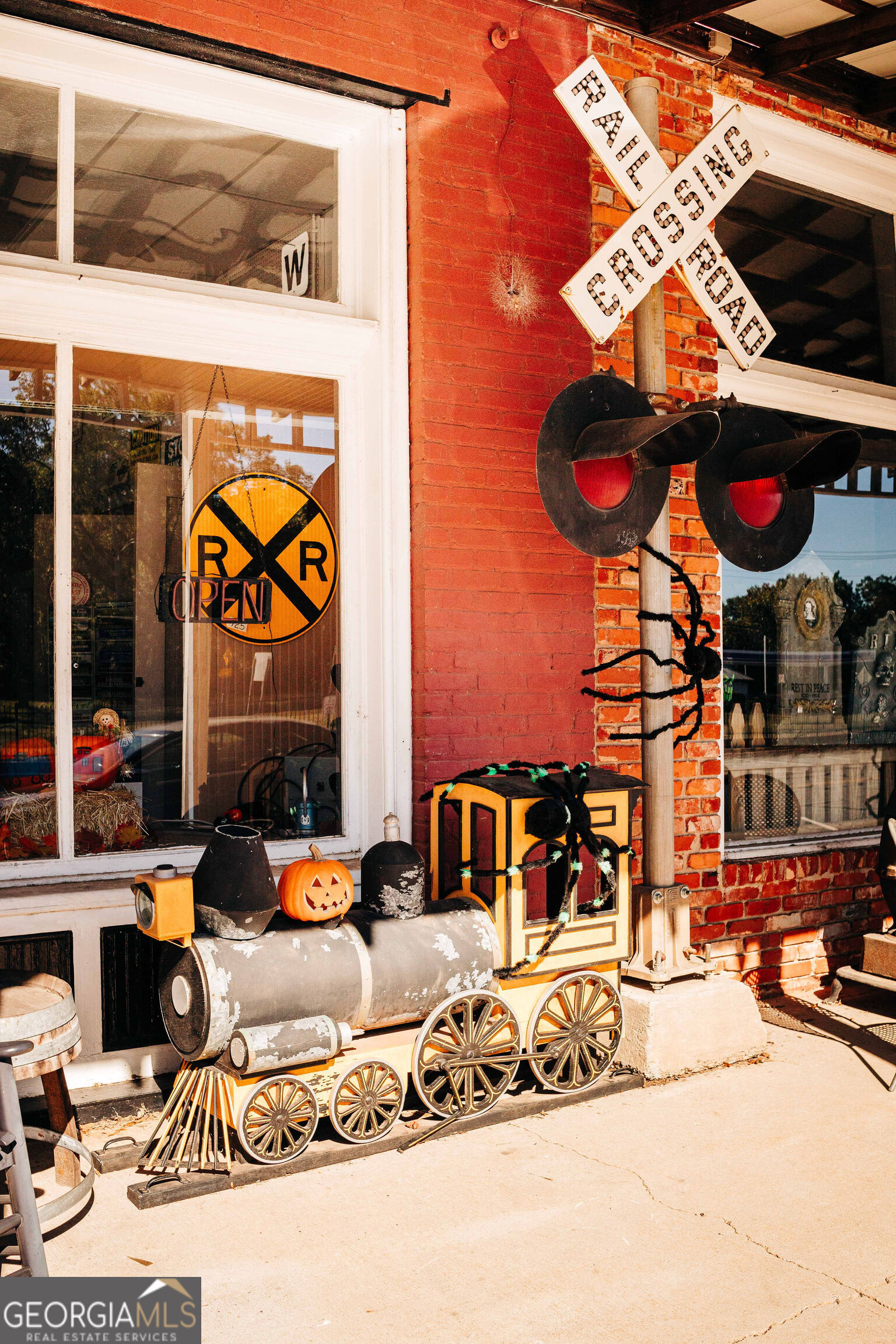 71 Avian Way, Unit 17B Auburn, GA 30011 - Photo 28 of 32 a view of a patio with a table and chairs