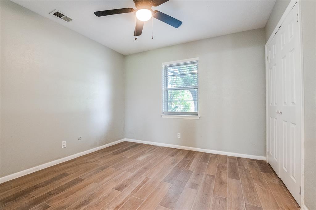 1533 East Springcrest Circle Lancaster, TX 75134 - Photo 17 of 25 Wood-finish flooring complementing light-toned walls