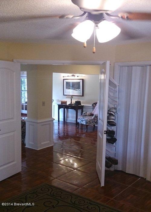 1153 Cotton Road Northeast Palm Bay, FL 32905 - Photo 14 of 18 COTTON BEDROOM TO LIVING AREA