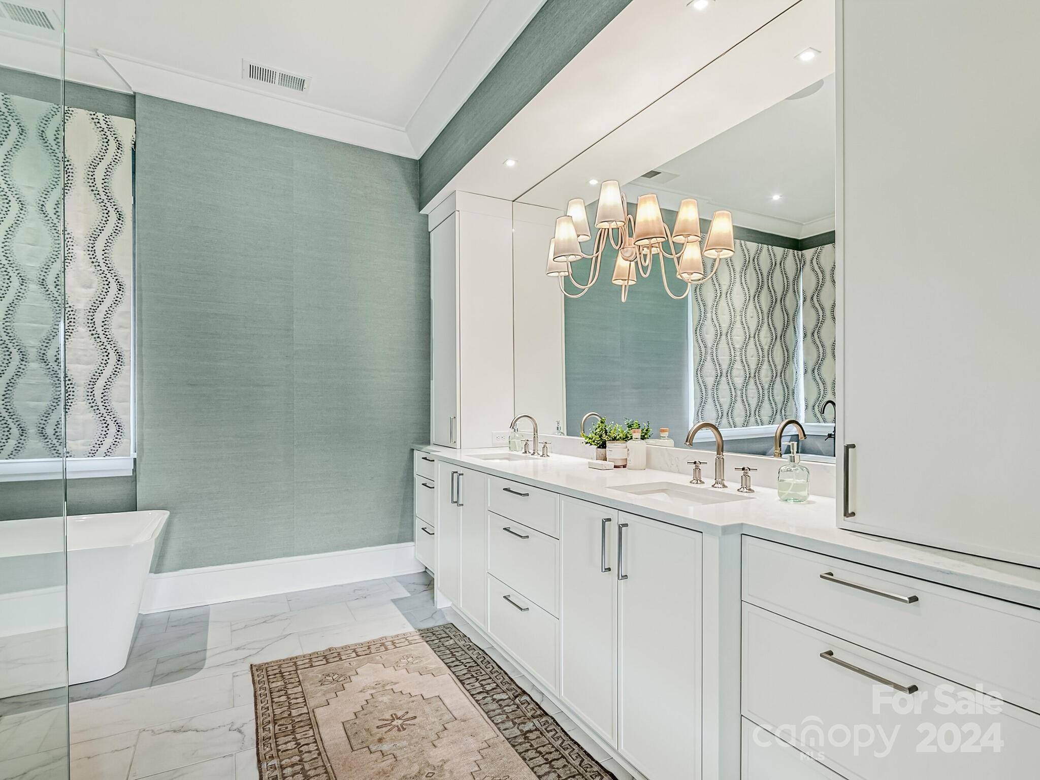 2717 Westfield Road Charlotte, NC 28209 - Photo 18 of 32 a bathroom with a double vanity sink mirror and shower