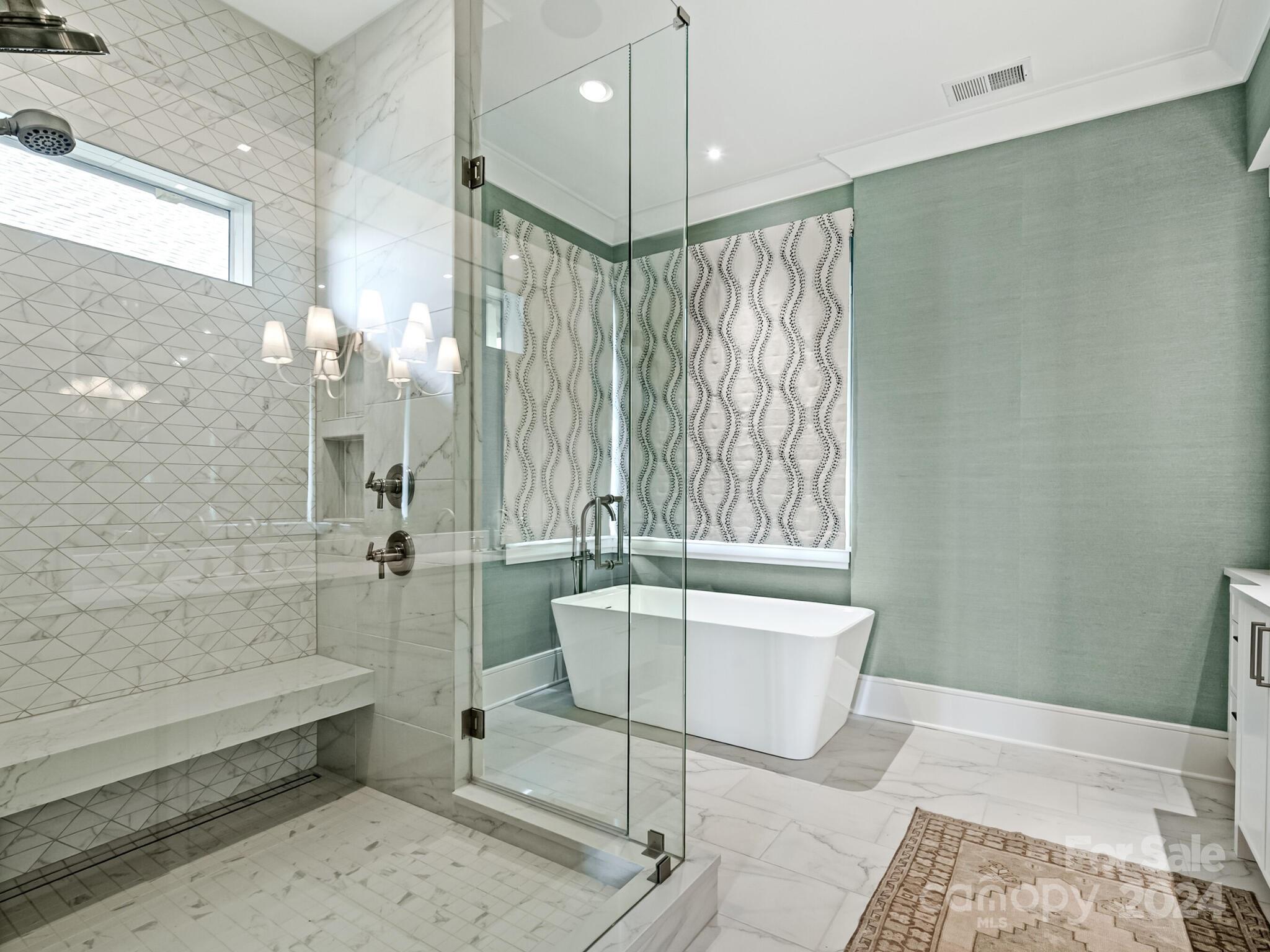 2717 Westfield Road Charlotte, NC 28209 - Photo 19 of 32 a spacious bathroom with a bathtub and shower