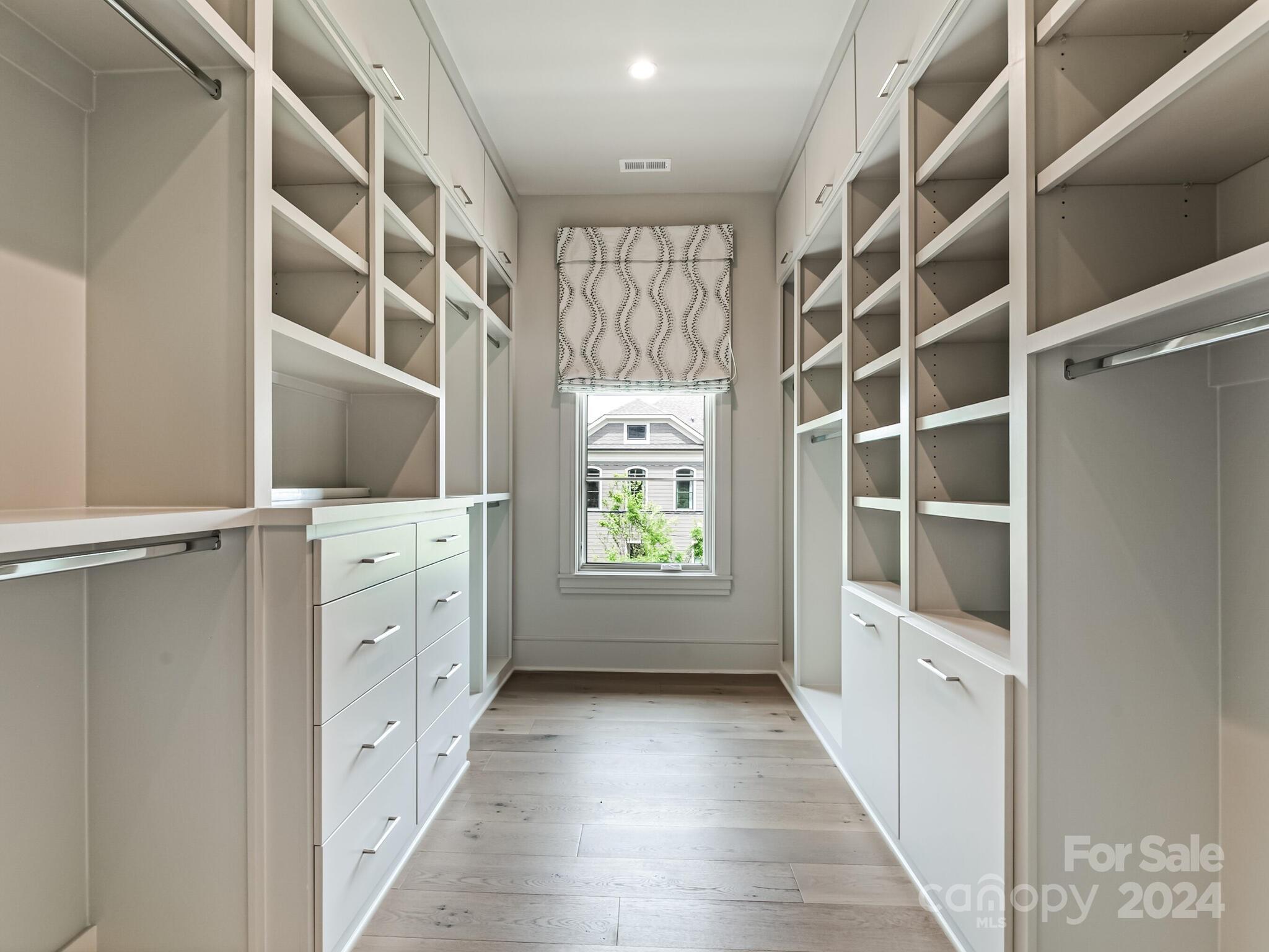2717 Westfield Road Charlotte, NC 28209 - Photo 20 of 32 a view of walk in closet with window